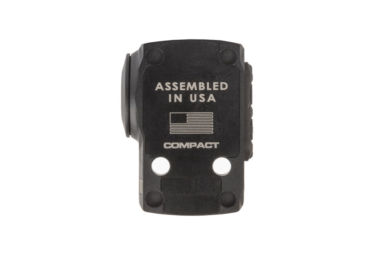 Schwarzes, kompaktes Leuchtpunktvisiergehäuse mit „Assembled in USA“-Text und amerikanischem Flaggensymbol auf weißem Hintergrund.