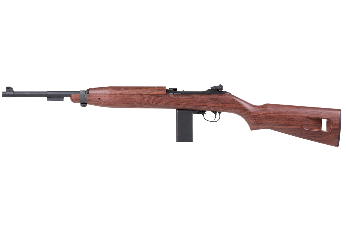 Seitenansicht eines M1 Carbine-Luftgewehrs mit realistischem Schaft aus Holzmaserung, schwarzem Metalllauf und Kastenmagazin.