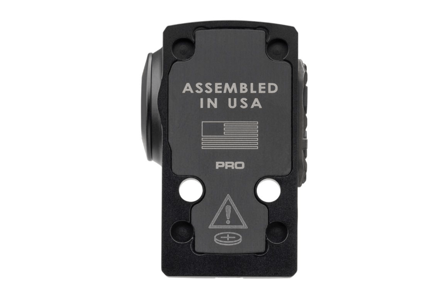 Schwarze Reflexvisierbasis mit dem Text „Assembled in USA“, einem Flaggensymbol und einem Batteriewarnsymbol auf weißem Hintergrund.
