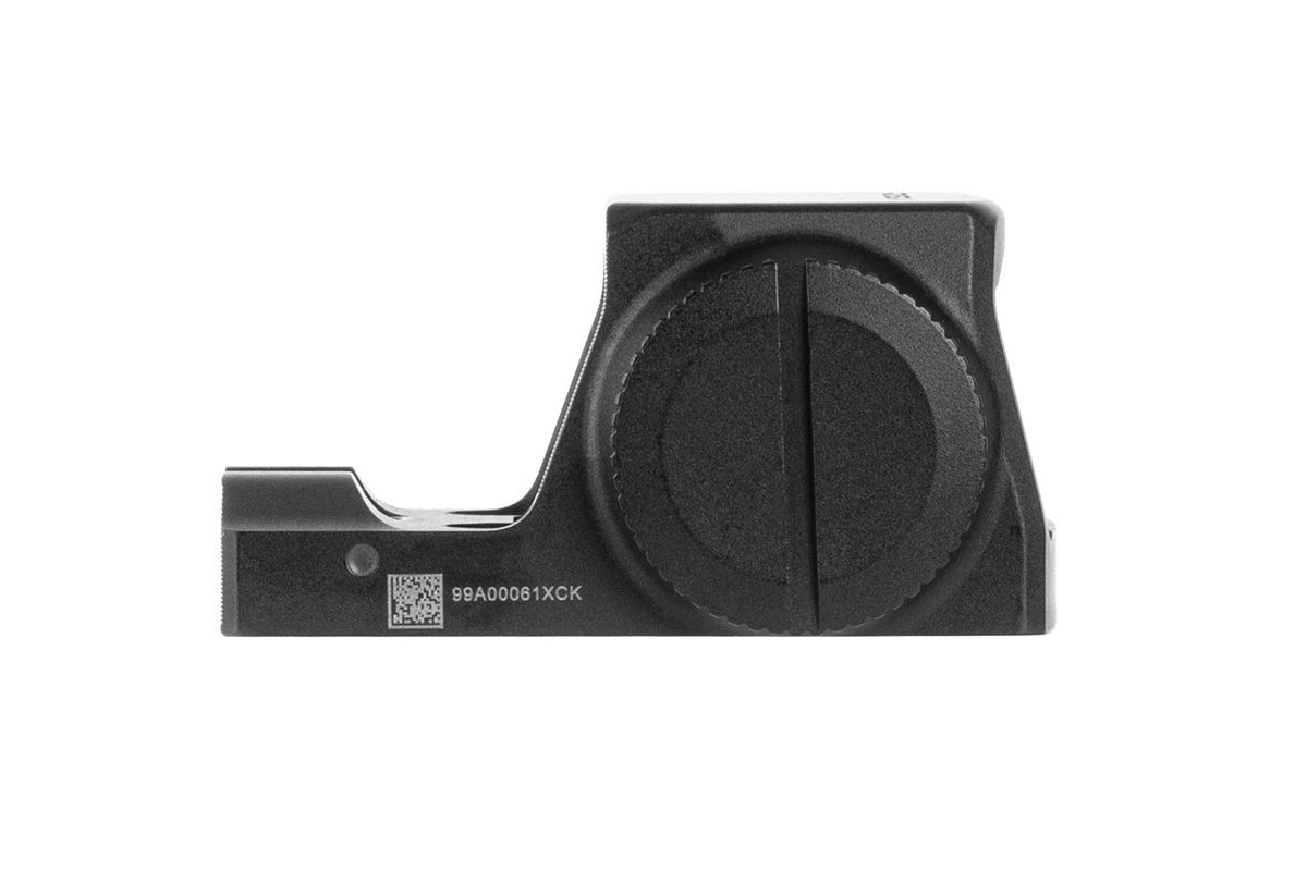 Seitenansicht eines schwarzen taktischen Leuchtpunktvisiers mit kreisförmigem Batteriefach und eindeutigem Seriennummerncode.