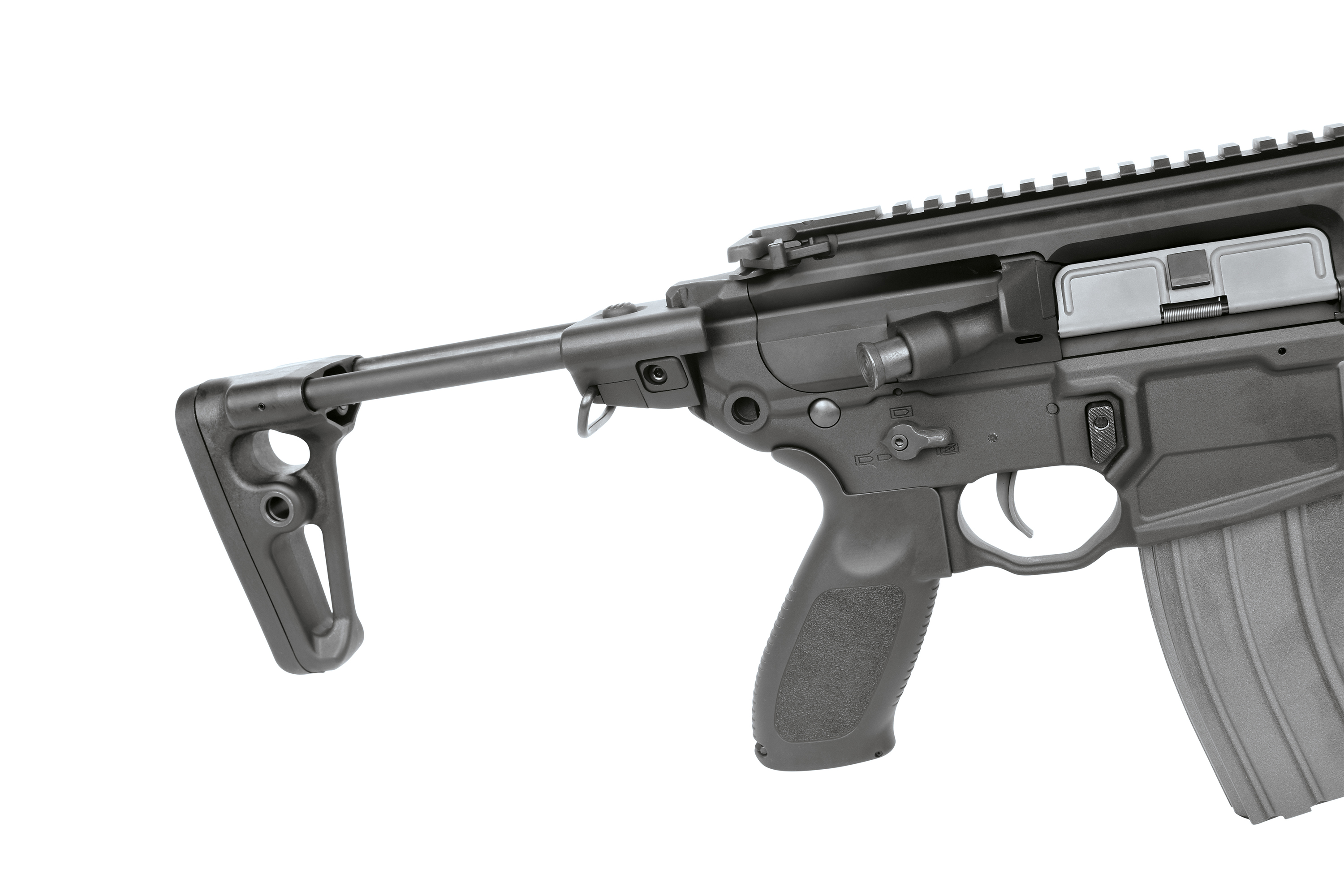 Nahaufnahme eines schwarzen Luftgewehrgehäuses mit zusammenklappbarem Schaft, strukturiertem Pistolengriff und integriertem Schienensystem.